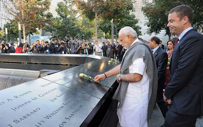 Prime Minister Narendra Modi paying tribute at Ground Zero, the 9/11 memorial, in New York, USA on Saturday. (Press Trust of India photo)