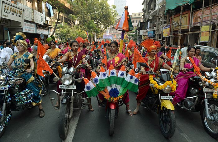 Revellers comprising women, dressed in traditional Marathi attire, took out processions amid beating of drums.