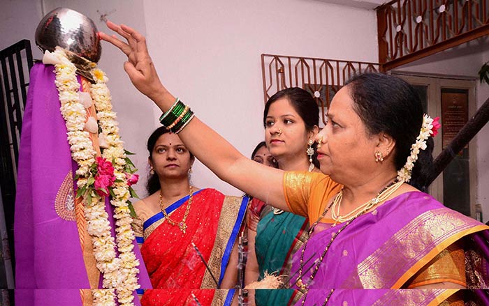 Marathi women offer prayers as they celebrate Gudi Padwa in Ahmedabad.