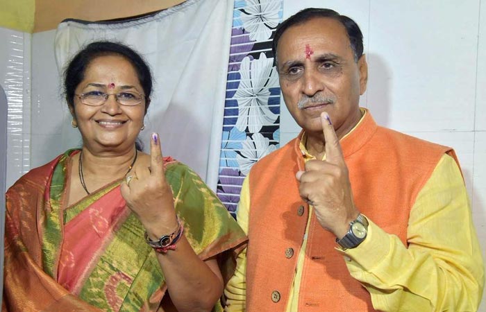 Gujarat Chief Minister Vijay Rupani casts his vote in Rajkot. He is contesting against Congress's Indranil Rajyaguru from Rajkot-West seat.