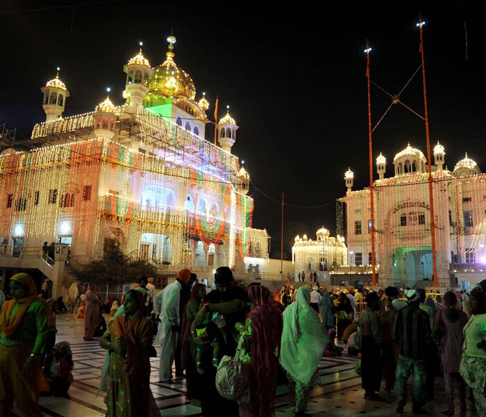 Illuminated Sri Akal Takht Sahib at the Golden Temple in Amritsar.The country celebrates Gurpurab, the birth anniversary of Guru Nanak, today. (AFP Photo)