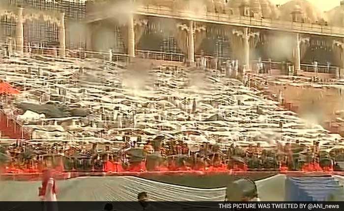 Thousands of performers and many spectators got drenched as rain washed out the venue of Sri Sri Ravi Shankar's event.