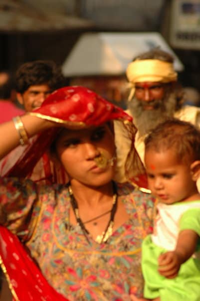 Many of the pilgrims have travelled miles to seek a darshan of the sought-after sadhus. (Image Courtesy: Tejas Mehta)