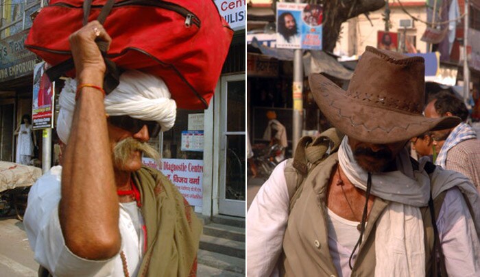 The holy men are often a mix of old and new, like this one who proudly sports the stylish shades. (Image Courtesy: Tejas Mehta)