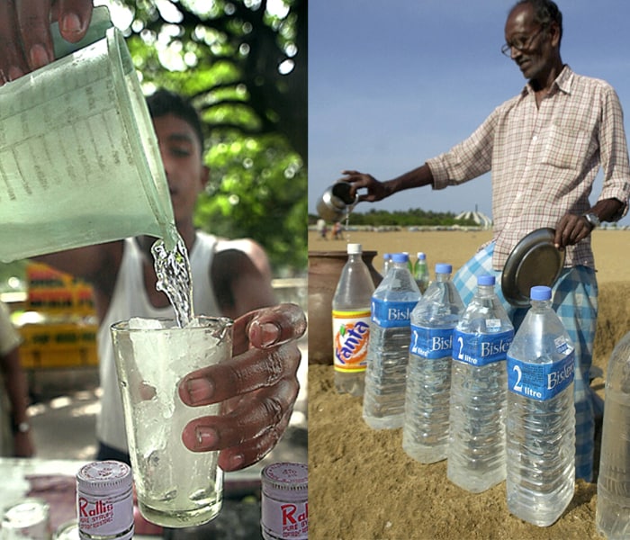 <b>Every drop matters:</b>A vendor carefully pours water into a container/glass for it to be sold. The dry and unkind summers have meant that water has become one of the most valued resources to man. (AFP image)