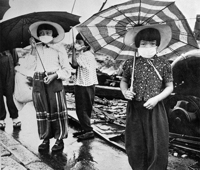 This photo dated 1948 shows children wearing masks to protect themselves from radiation in the devastated city of Hiroshima nearly three years after the US bombing at the end of World War II. (AFP Photo)