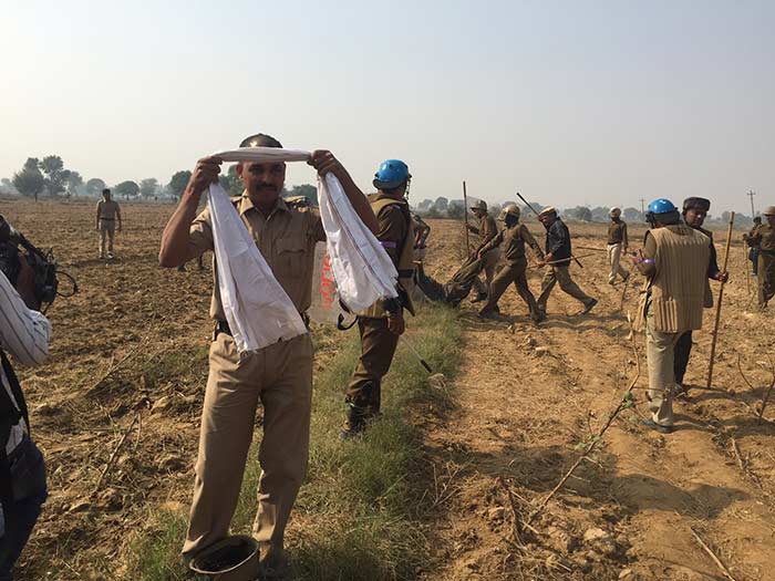 Haryana police chief SN Vashishth said at least 2-3000 people, including women and infants, were sitting outside the ashram as a human wall.