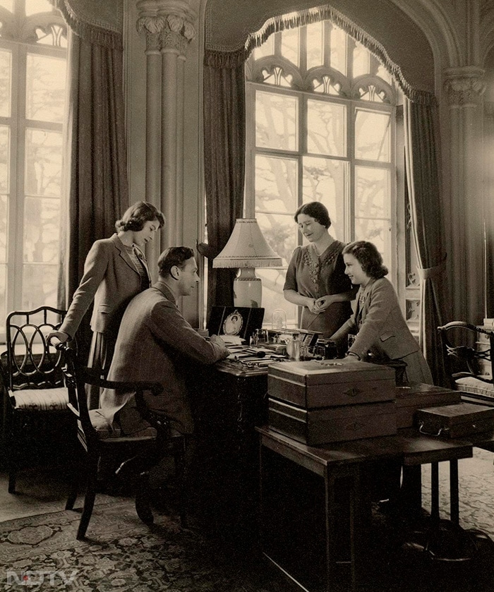 This photo taken in 1943 shows Princesses Elizabeth and Margaret along with their parents, the late King George VI and Queen Mother. (Cecil Beaton)