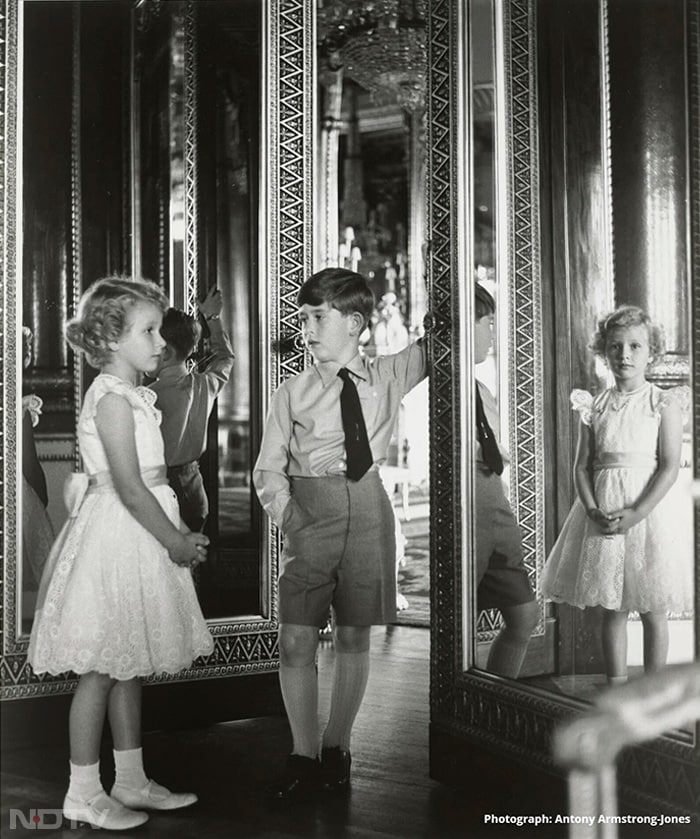 A young Princess Anne and Prince (now King) Charles are seen in this 1956 photograph taken by Lord Snowdon as part of a series to mark the prince's eighth birthday. (Lord Snowdon)