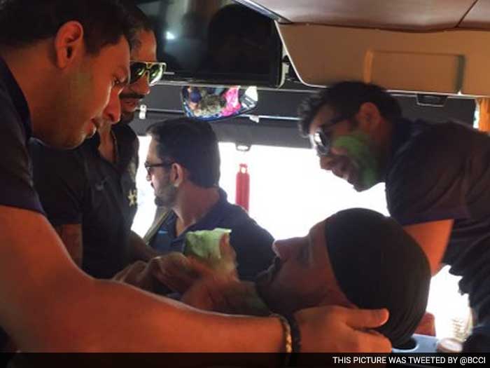 Indian cricket team players celebrated Holi after a nail-biting finish to the twenty-20 match with Bangladesh in Bengaluru.