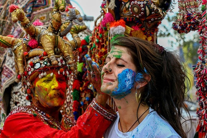 Holi 2022: Tourists celebrate Holi in Pushkar, Rajasthan. (PTI)