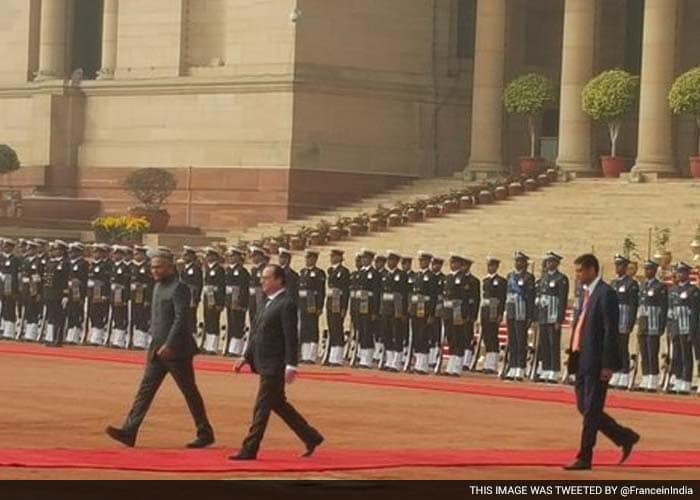 President Hollande reviewing troops at Rashtrapati Bhavan.