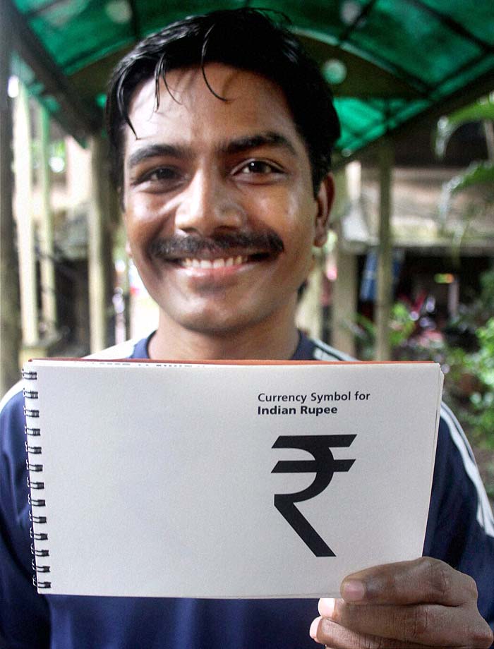 D Udaya Kumar, an assistant professor at IIT Guwahati, hit headlines in 2010 for designing the Rupee symbol.<br><br> His design, based on the Indian tricolor, was selected from among five short listed symbols.