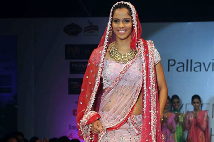 Saina Nehwal's has been a fairytale story this year (2010) with the ace shuttler reaching new heights both professionally and personally.<br><br>
Not only did she shine on the court, Saina also made a style statement by walking the ramp in bridal wear. She signed new endorsement deals, appeared on the cover page of magazines and all this while continuing to perform at the top level.<br><br>
According to industry analysts, Saina, who was charging around Rs. 50 lakh per endorsement, is now able to command Rs. 1 crore per deal after her CWG win.