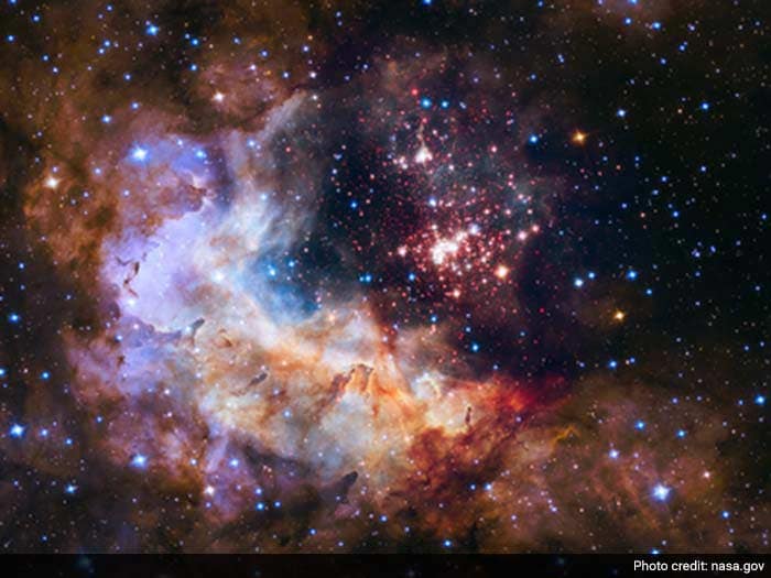 NASA: The brilliant tapestry of young stars flaring to life resemble a glittering fireworks.