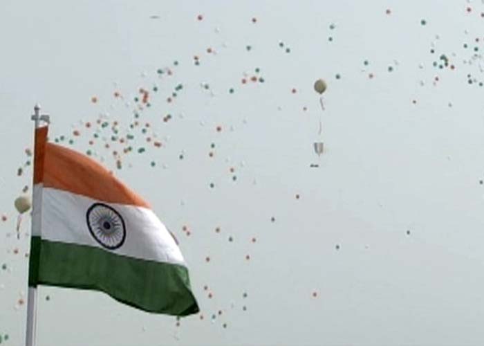 The Indian Flag flutters high at the Red Fort as balloons in the colour of Inda's National Flag - Tiranga (Tricolour)fill the sky in front of the Red Fort in Delhi. Prime Minister Narendra Modi addressed the nation on India's 68th Independence Day.