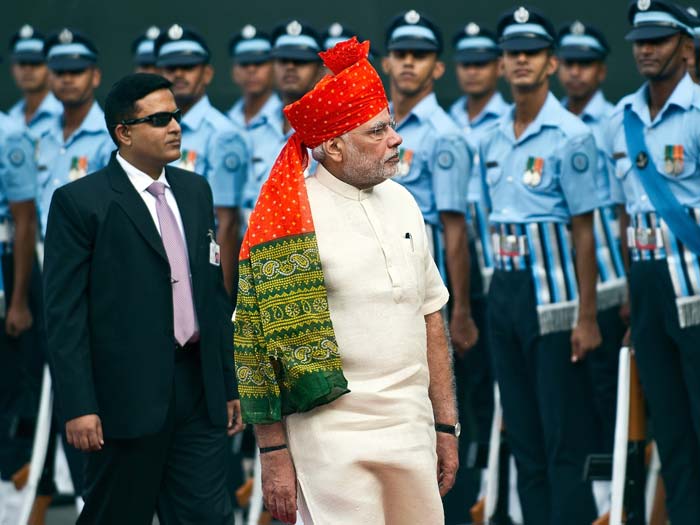 Prime Minister Narendra Modi inspects a guard of honour for the country's 68th Independence Day at the Red Fort in New Delhi on August 15, 2014.