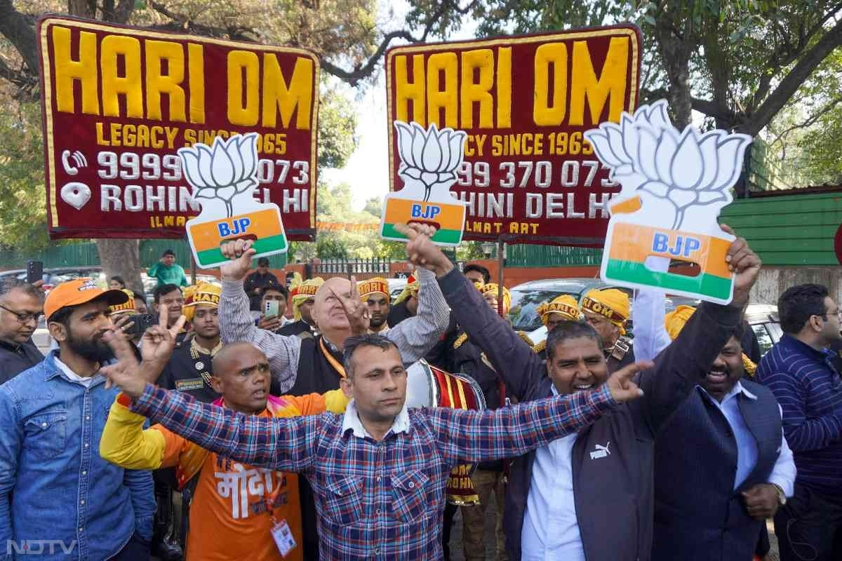 BJP supporters celebrate the party's big win in Delhi Assembly polls.