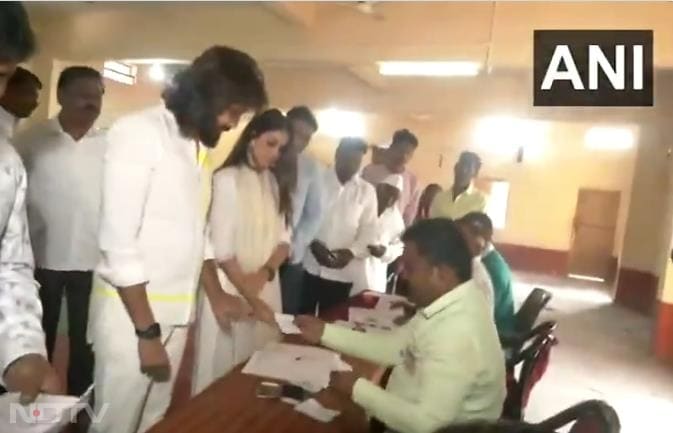 Actor couple Riteish Deshmukh and Genelia D'Souza cast their votes at a polling station in Latur