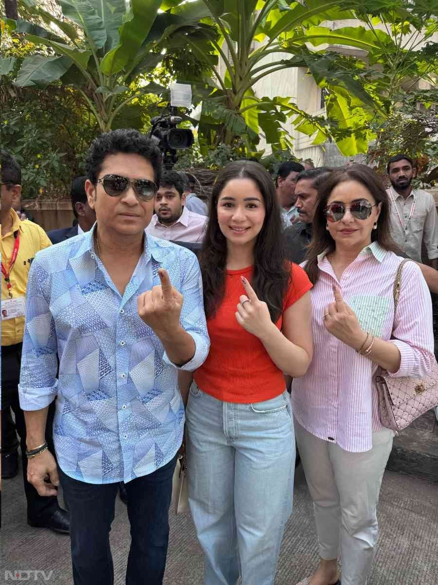 Sachin Tendulkar along with his wife Anjali and daughter Sara cast their vote at a polling booth in Mumbai