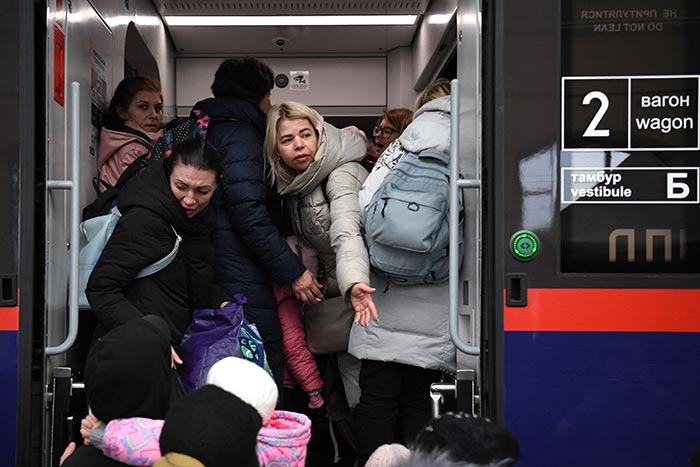 In Pics: Ukrainians In Lviv Wait For Hours To Board Trains, Fleeing Russian Attacks