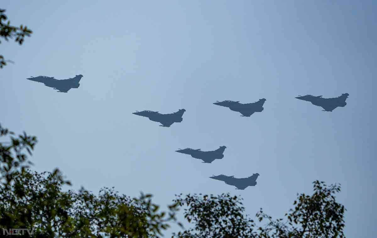 India Air Force's six Rafale aircrafts fly past in a formation during the full dress rehearsal