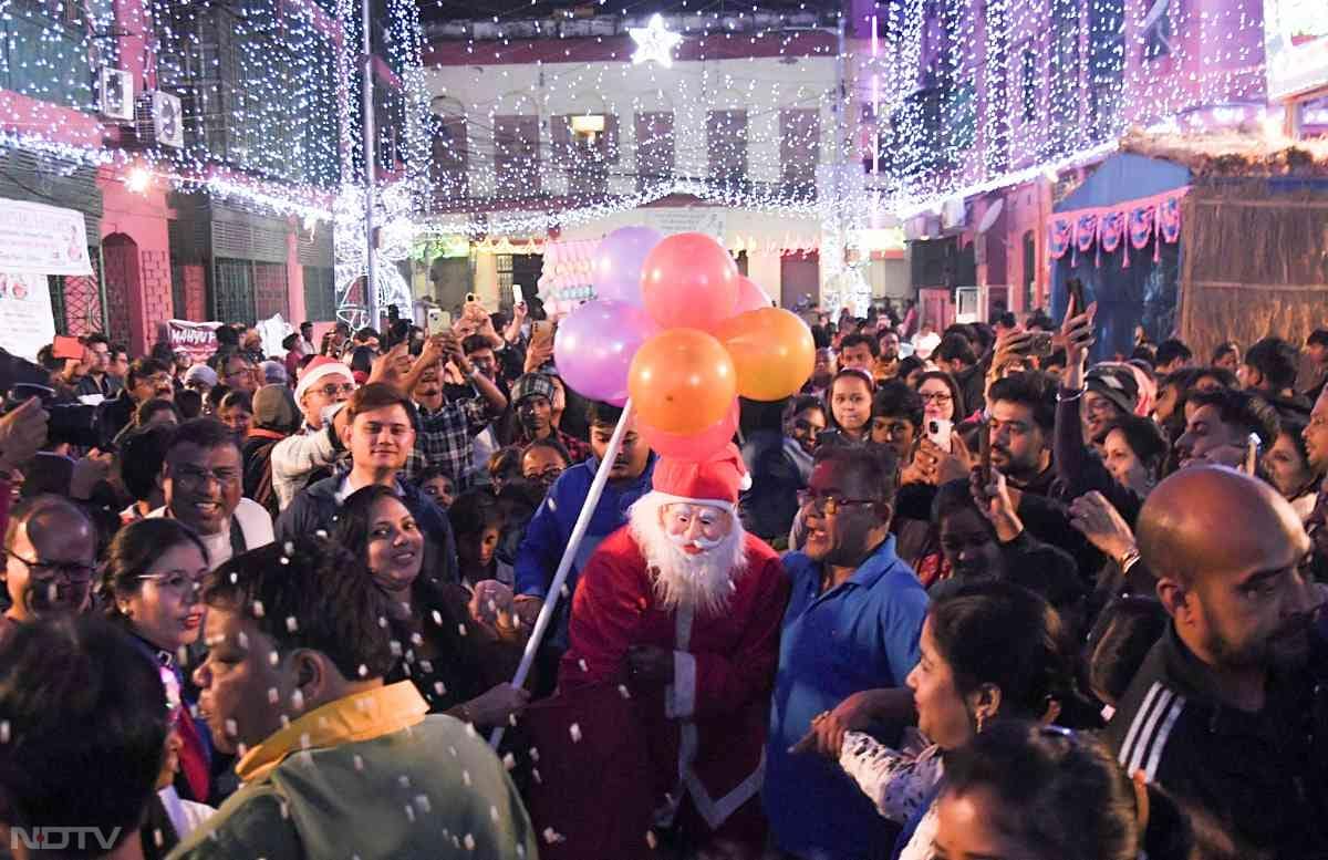 People gather at Bow Barracks on Christmas Eve in Kolkata