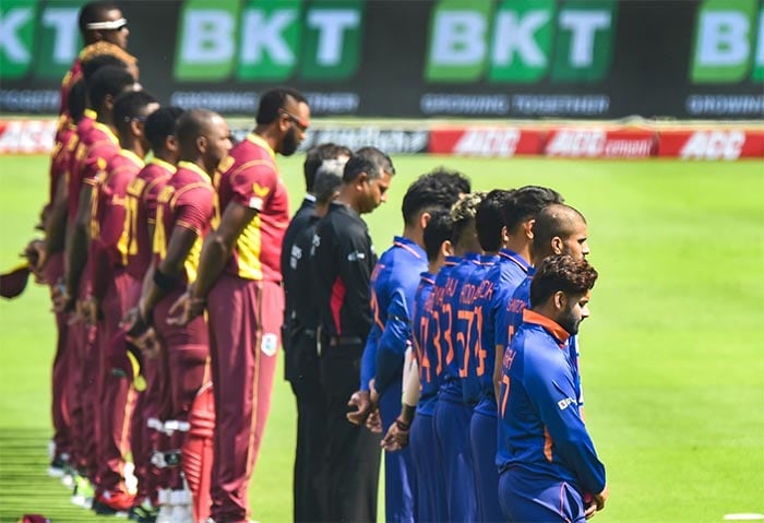 Ahmedabad: Players of India and the West Indies stand-in in silence to pay their respects to Bharat Ratna Lata Mangeshkar who died on Sunday morning before the first ODI cricket match between India and West Indies, at the Narendra Modi Stadium, in Ahmedabad, Sunday, February 6, 2022. (PTI Photo)