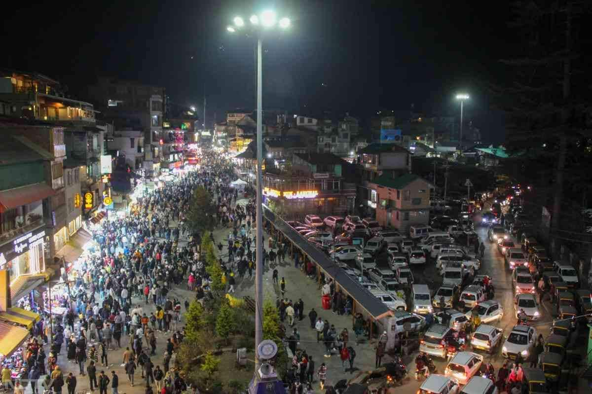 In Himachal Pradesh's Manali, a popular tourist destination, crowds danced and cheered in the streets