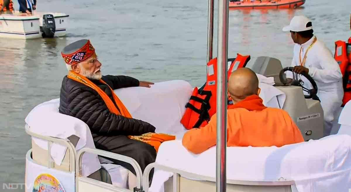 Prime Minister Narendra Modi with Uttar Pradesh Chief Minister Yogi Adityanath during Maha Kumbh Mela in Prayagraj