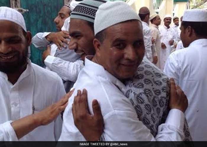 Two men hugging each other on Eid in Jaipur.