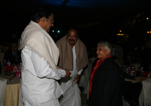 Home Minister P Chidambaram, former BJP Chief Venkaiah Naidu and Delhi Chief Minister Sheila Dixit&nbsp;engage in a light chat at NDTV's Indian of the Year awards ceremony in New Delhi.
