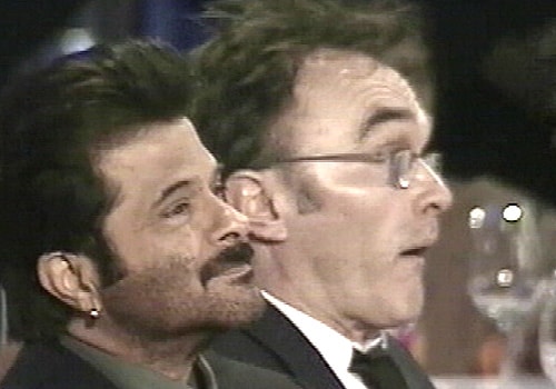 Anil Kapoor and Danny Boyle look on as NDTV's Indian of the Year awards ceremony progresses. The <em>Slumdog Millionaire</em> team was awarded the NDTV award for Global Excellence for the year 2008.