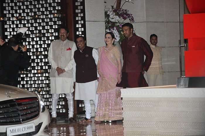 Mukesh and Neeta Ambani welcome Isha Ambani's fiance Anand Piramal and his father Ajay Piramal