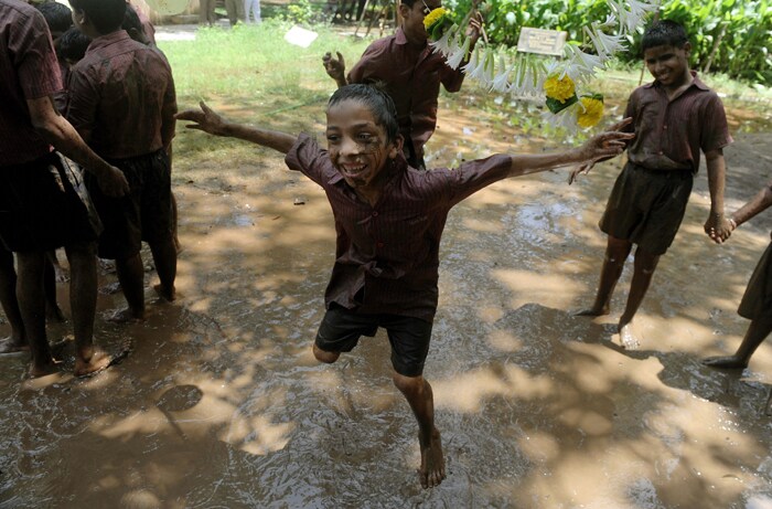 A visually impaired child dances during the event. The event was celebrated with great joy and zeal. (AFP Photo)