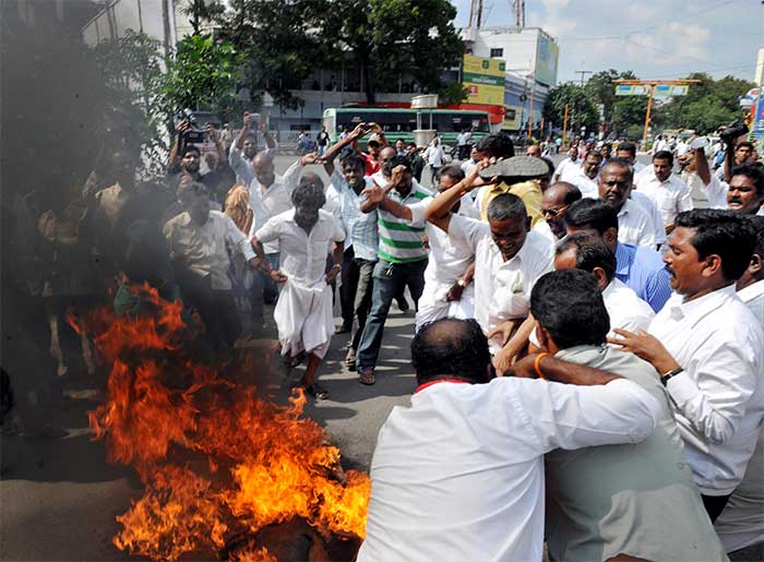 In Coimbatore, AIADMK supporters protested after a Bangalore court pronounced Ms Jayalalithaa guilty. (Press Trust of India Photo)