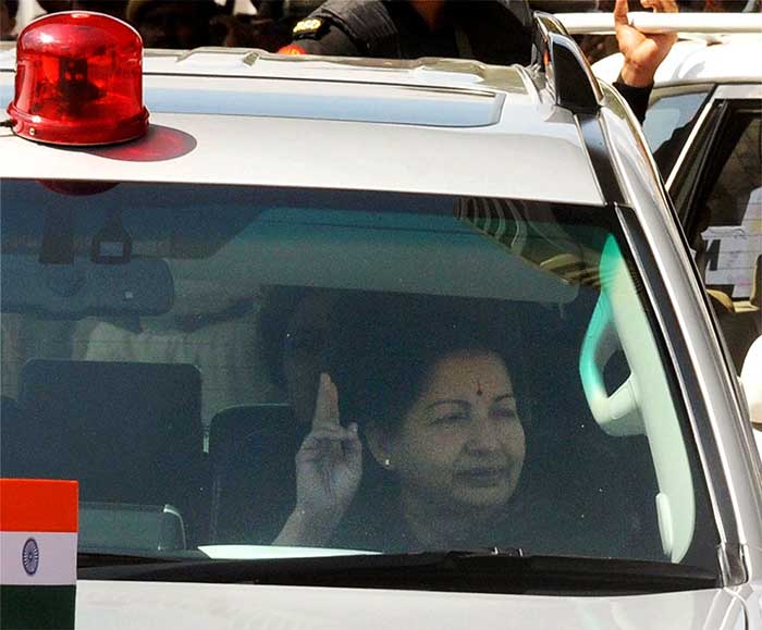 Ms Jayalalithaa flew from Chennai to Bangalore on Saturday morning to attend the hearing, which took place in a makeshift court created at the Bangalore Central Jail on the outskirts of the city. (Press Trust of India Photo)