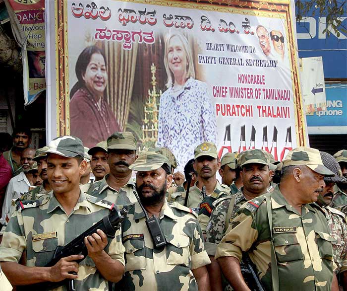 There was heavy security deployment with 4,000 personnel on duty in Bangalore. Nearly 2,000 policemen were deployed near the court. Vehicles were thoroughly checked at the Tamil Nadu-Karnataka border. (Press Trust of India Photo)