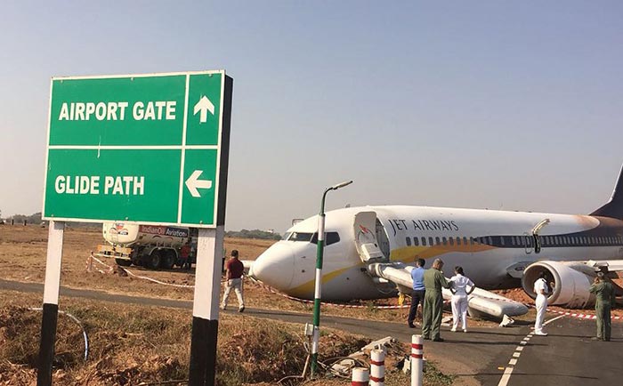 The plane was seen partly on the runway, its nose tilted down.