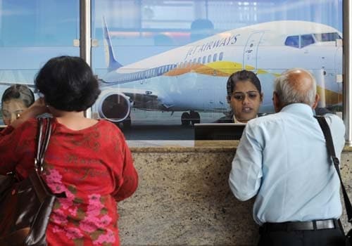 <span class="lh16 fa fs12 fb">Air travellers wait at the Jet Airways counter at the city airport in Mumbai on September 8, 2009. Flights on India's second-largest private airline, Jet Airways, were disrupted on September 8 after a number of pilots went on what the company called a "simulated strike" and reported sick.<br><br>Several flights around the country, including 35 from Mumbai and 18 from New Delhi, were cancelled as a result of the action, which Jet Airways said was a "planned sabotage of operations". (AFP Photo) </span>