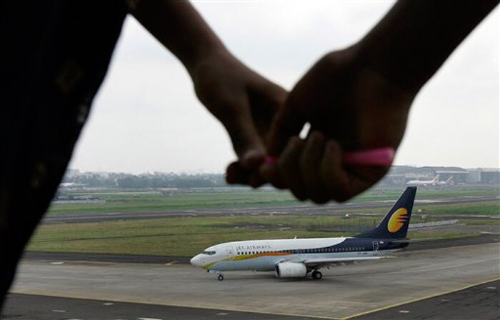 <p><strong>Jet back on runway:</strong> A Jet Airways aircraft on the tarmac, ready to take off at the Santacruz domestic airport terminal in Mumbai.<br />
<br />
Pilots at the airline resumed work on Sunday, ending their five-day strike which caused chaos, left thousands of passengers stranded and the company in huge financial loss. <em>(AP)</em></p>
