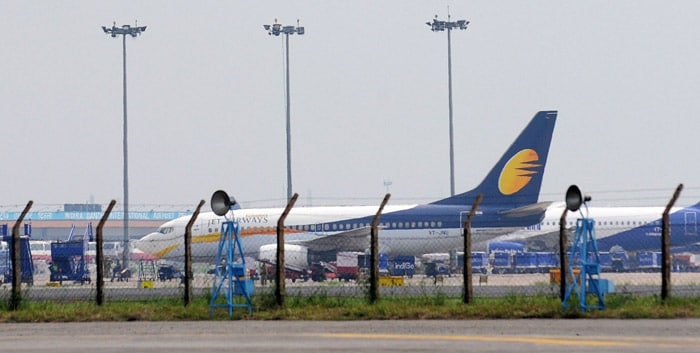 <strong>Will fly again:</strong> A Jet Airways aircraft sits on the tarmac at the domestic terminal of Indira Gandhi International Airport in New Delhi.<br />
<br />
Over 400 pilots stayed away from work during the strike, forcing the airline to cancel hundreds of flights and leaving thousands of passengers stranded.<br />
<br />
The end to the pilots' stir came after protracted negotiations, demands and counter-demands. <em>(AFP)</em>