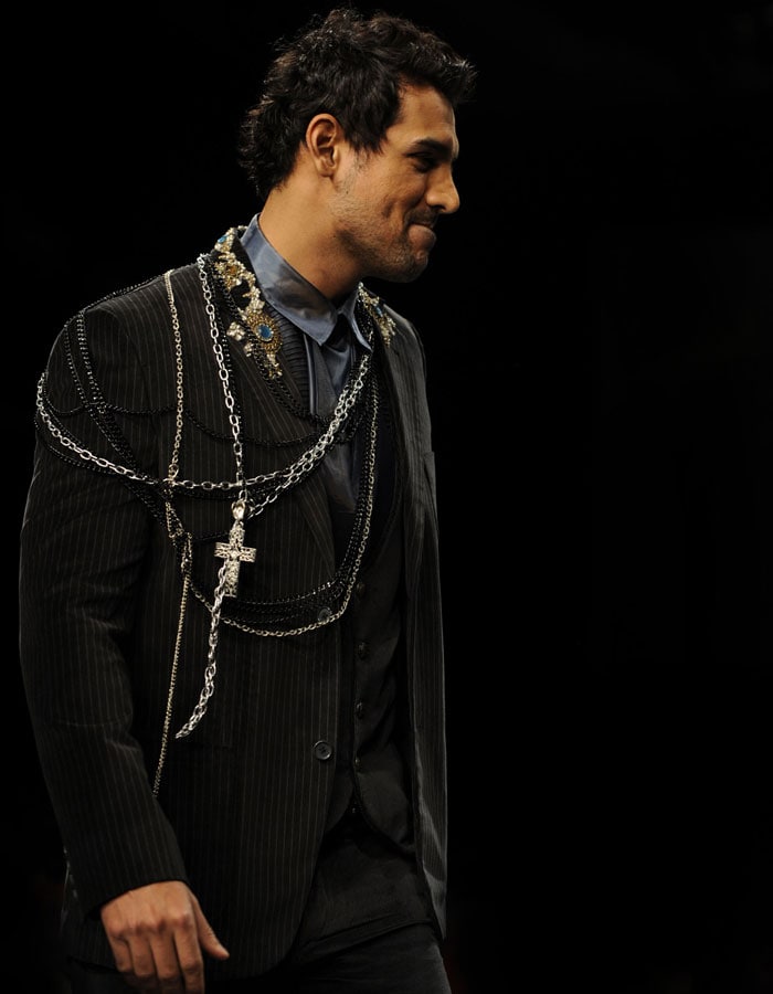 John Abraham showcases creations by Indian designer Rocky S on the third day of Lakme Fashion Week (LFW) Spring/Summer 2010 in Mumbai on September 20, 2009.