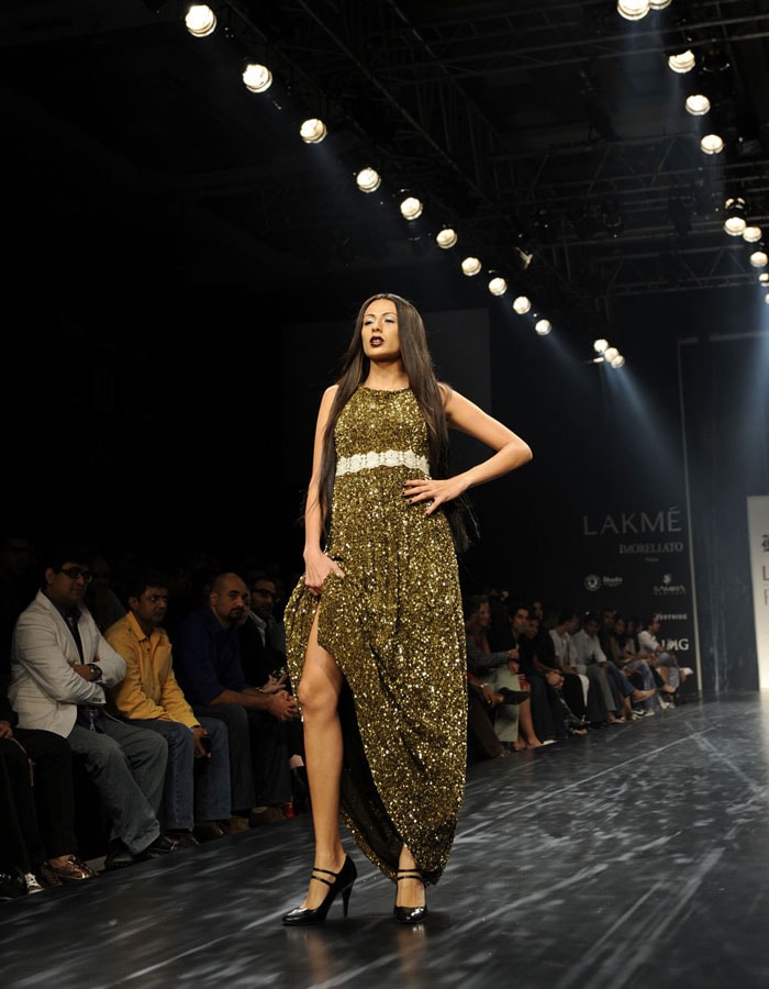 A model showcases a creation by Indian designer Rocky S on the third day of Lakme Fashion Week(LFW) Spring/Summer 2010 in Mumbai on September 20, 2009. (Pics: AFP)