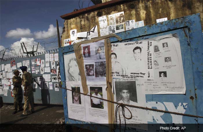 Dehradun airport\'s wall plastered with hundreds of photographs of missing