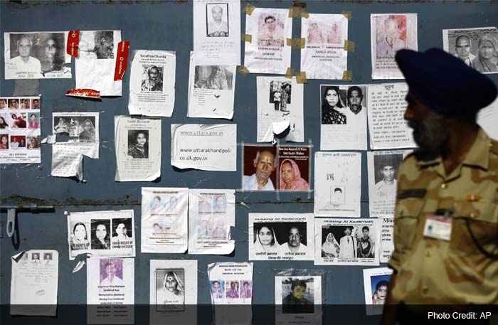 Dehradun airport\'s wall plastered with hundreds of photographs of missing