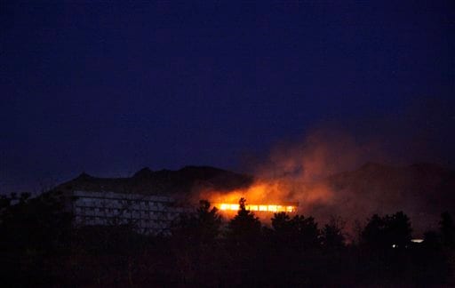 As the helicopters attacked and Afghan security forces moved in, four massive explosions rocked the hotel. Officials at the scene said the blasts occurred when security forces either fired on suicide bombers or they blew themselves up.