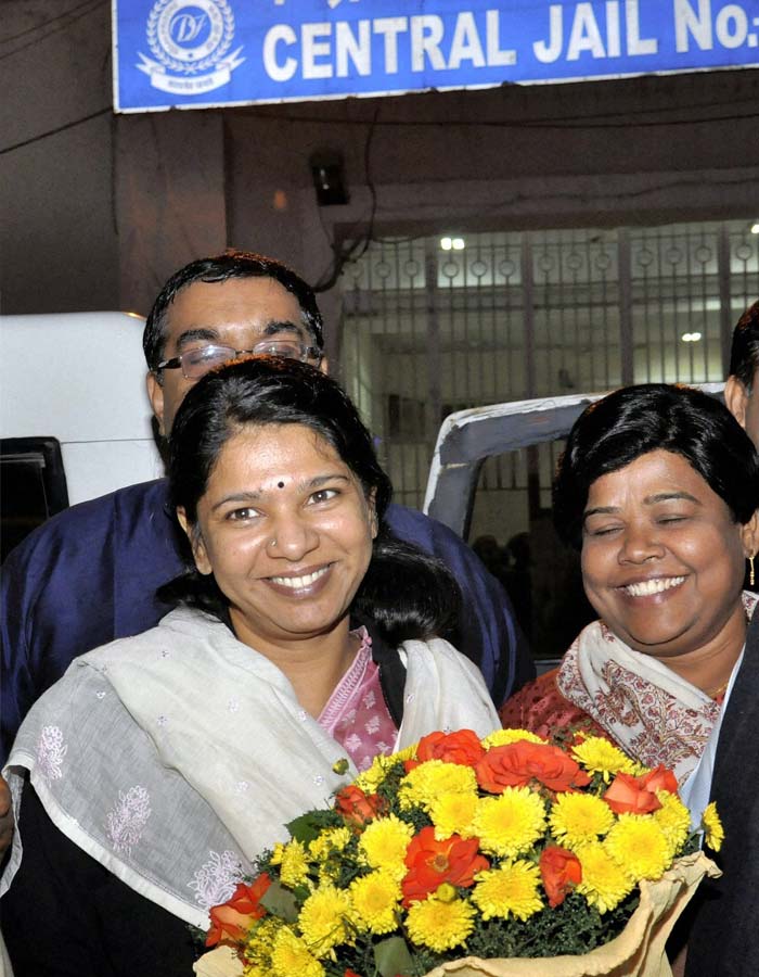 Dressed in a pink salwaar-kameez, Kanimozhi emerged from Tihar Jail at 7:30 this evening. The daughter of the DMK president used a rear gate to drive out - an attempt to evade the hundreds of cameras that were waiting.