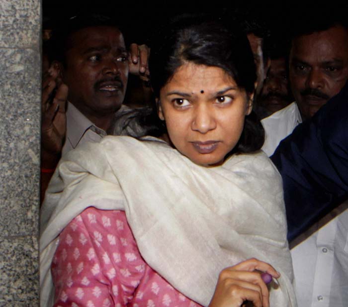 While a huge media contingent waited outside country's largest prison to capture the moments of her coming out, Kanimozhi was whisked away in a convoy of cars from a gate which was out of the media's view.