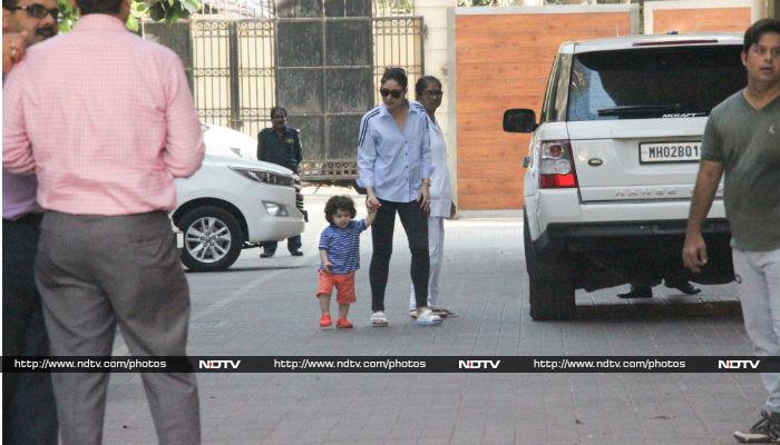 It was a busy day for Kareena Kapoor, as she was spotted at several locations across Mumbai on Monday. <br><br> Kareena Kapoor took some time out for son Taimur and both were spotted outside Amrita Arora's apartment.